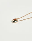 Mia gold necklace with turquoise stone detail around the charm on a gold chain by MyAleph