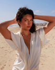 Model wearing MyAleph Chai Necklace in silver, Hebrew life symbol pendant styled for everyday summer jewelry
