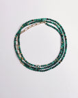 Juliana Belly Chain in Malachite Quartz with Evil Eye Charm and 14k Gold-Plated Chain Links – Flat Lay on White Background