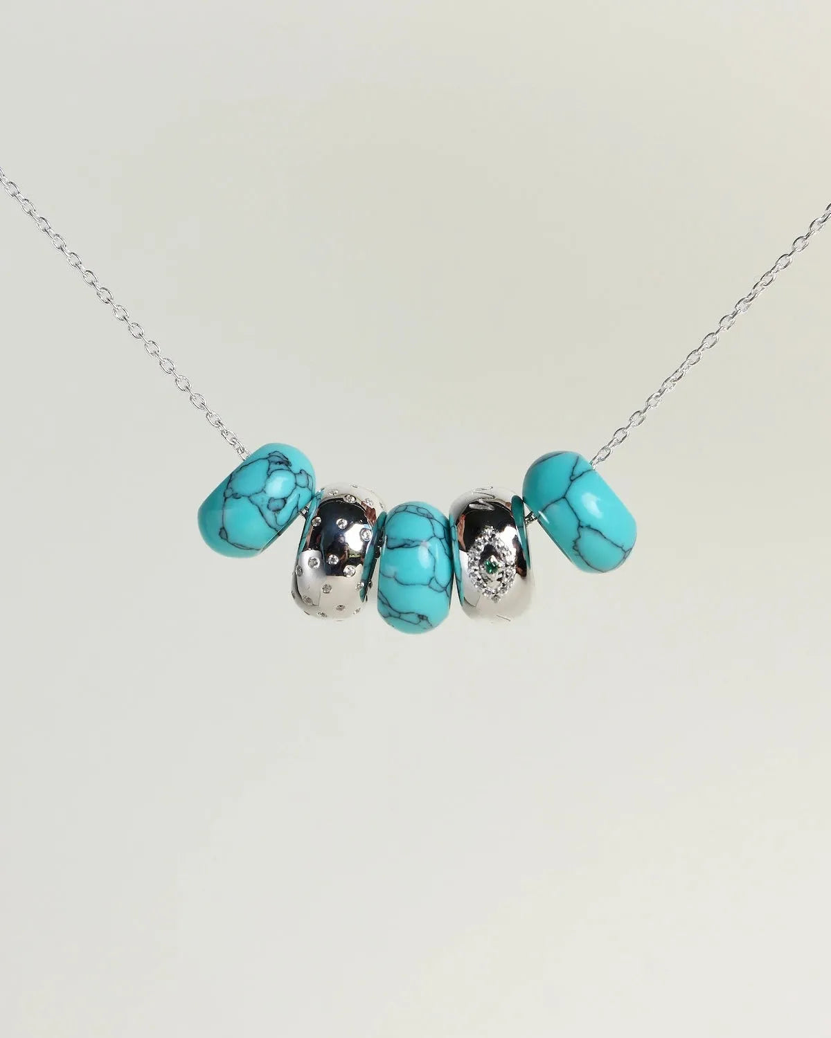 Ava silver necklace with turquoise quartz beads and diamond-detailed charms on a silver chain by MyAleph