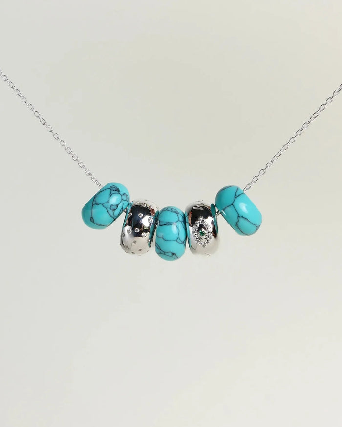 Ava silver necklace with turquoise quartz beads and diamond-detailed charms on a silver chain by MyAleph