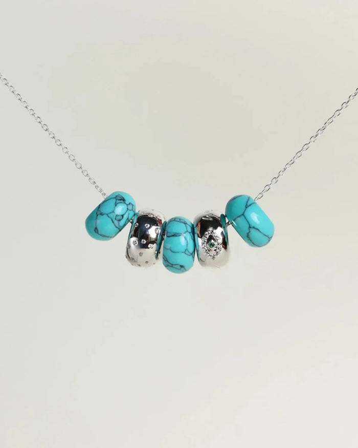 Ava silver necklace with turquoise beads and diamond-detailed charms on a silver chain by MyAleph