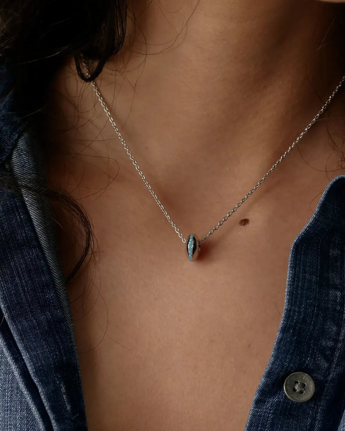 Mia silver turquoise pendant necklace worn solo with a denim shirt, MyAleph We Are One Collection