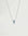 Mia silver necklace showing turquoise stone detail around the charm on a silver chain by MyAleph