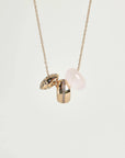 Noa gold necklace with rose quartz bead and diamond-detailed charms on a gold chain by MyAleph