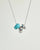 Noa silver necklace with turquoise quartz bead and diamond-detailed charms on a silver chain by MyAleph