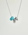 Noa silver necklace with turquoise quartz bead and diamond-detailed charms on a silver chain by MyAleph
