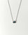Aura Evil Eye necklace featuring a turquoise gemstone set in a silver tone pendant with premium rhodium plated hardware on a delicate chain.