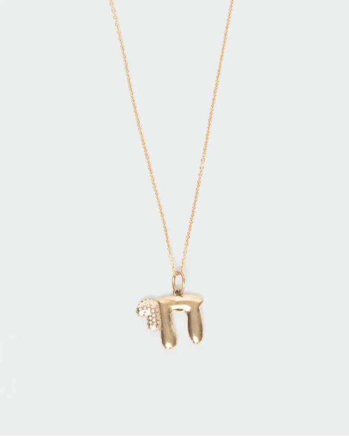 MyAleph gold Chai Necklace with Hebrew life symbol pendant, white stone detail, and delicate chain on white background