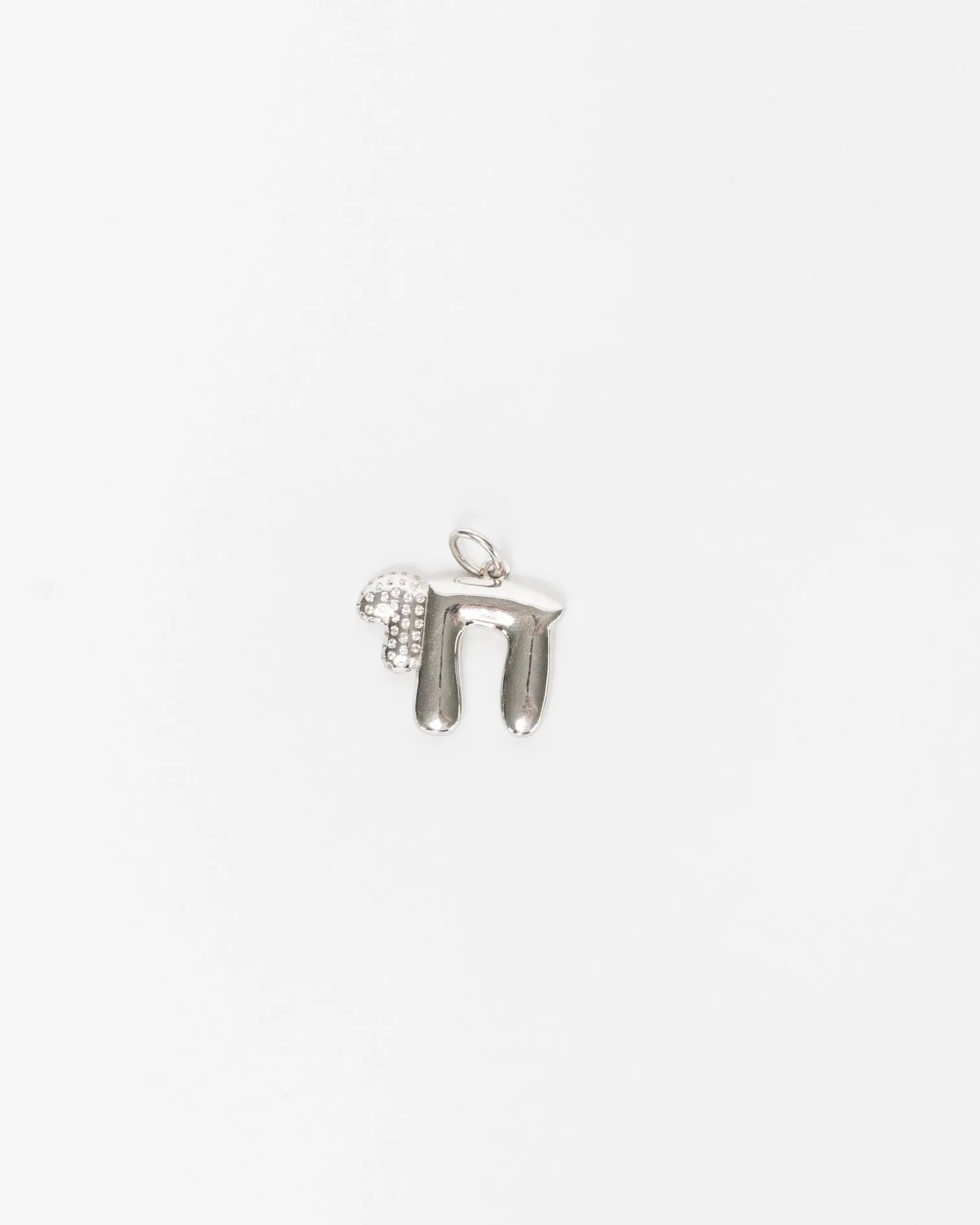 Close-up of MyAleph silver Chai pendant with Hebrew life symbol and white stone detail