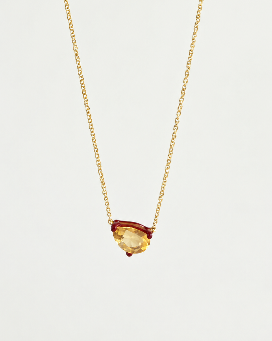 Eden Necklace with a pear cut Citrine Gemstone and bordeaux enamel on an 18k gold-plated chain