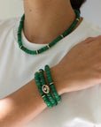 Emerald quartz jewelry set with beaded necklace and stacked bracelets, gold details