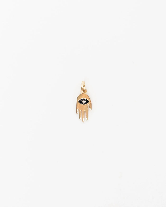 MyAleph gold Flat Hamsa evil eye charm with black enamel eye and white stone center, protective hand pendant