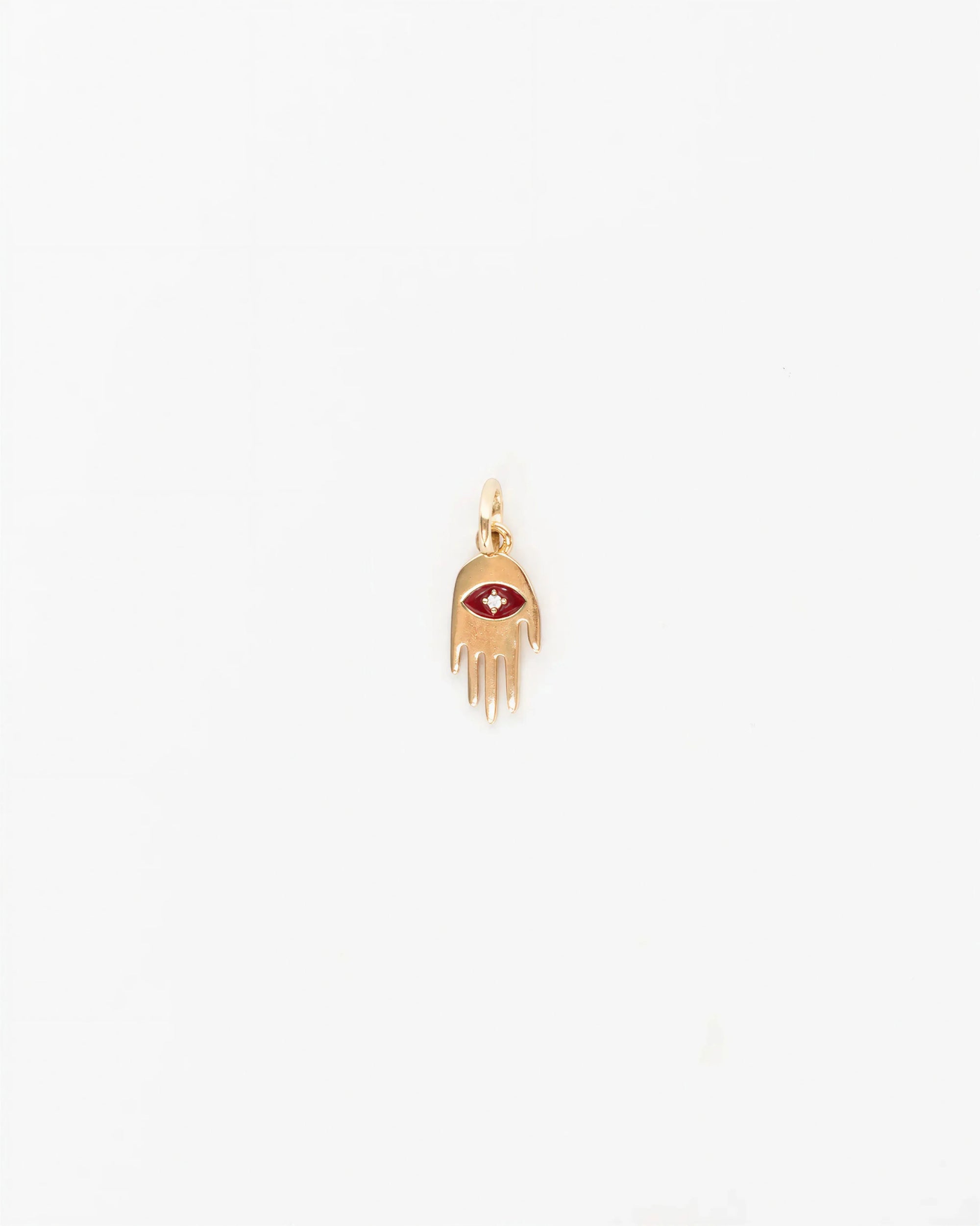 MyAleph gold Flat Hamsa evil eye charm with red enamel eye and white stone center, protective hand pendant