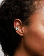 Model wearing MyAleph Galet Ear Cuff with turquoise stones, no-piercing sterling silver ear cuff