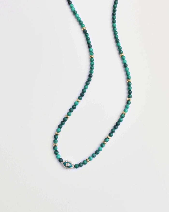  Detail view of Juliana Belly Chain in Malachite Quartz featuring Evil Eye Charm and gold clasp
