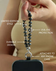 Detail shot of Mini Aura smoky quartz beads with premium dipped silver dividers and evil eye talisman charm.