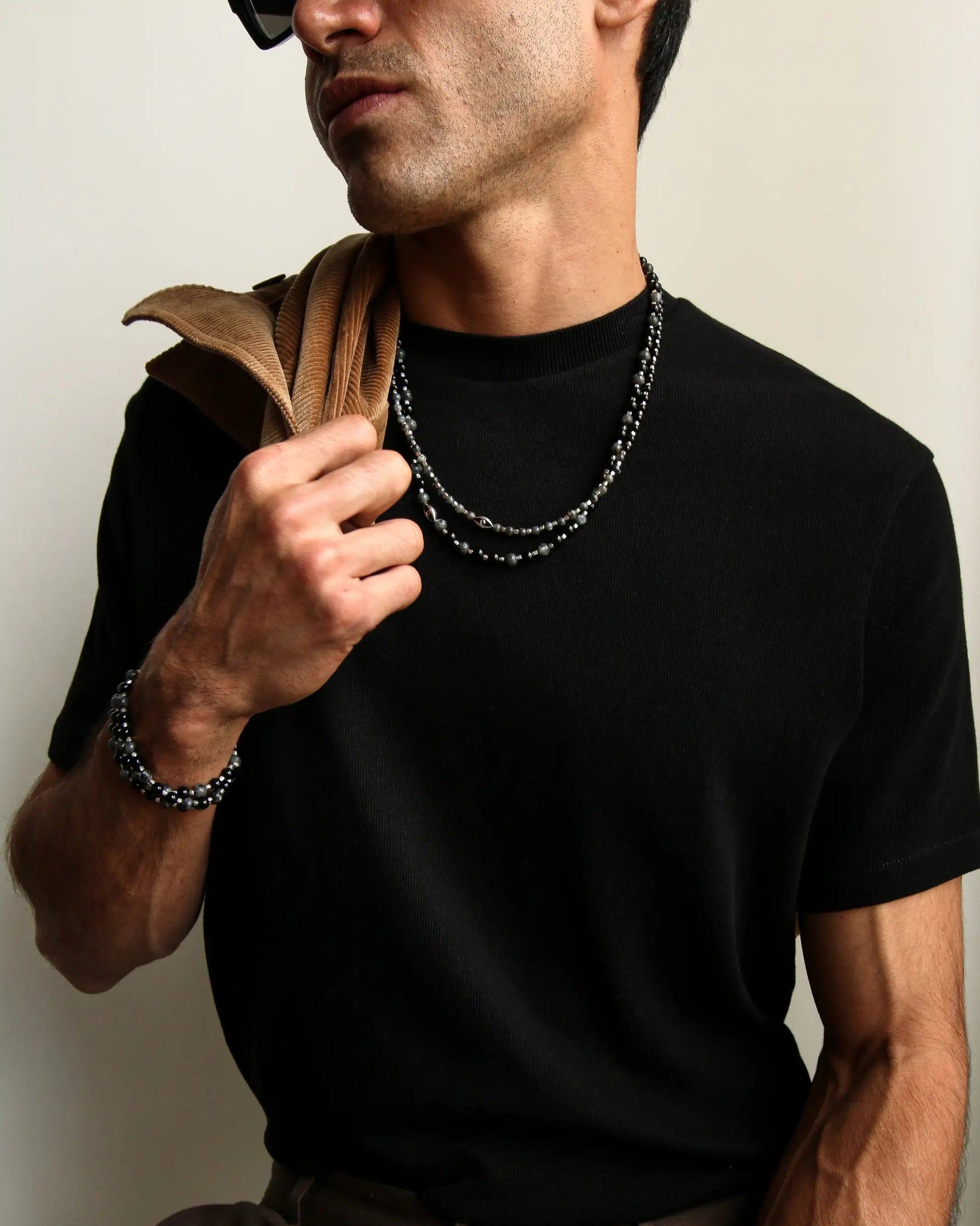 Male model wearing MyAleph men’s collection in Silver, styled with layered quartz necklaces for a confident, polished look.