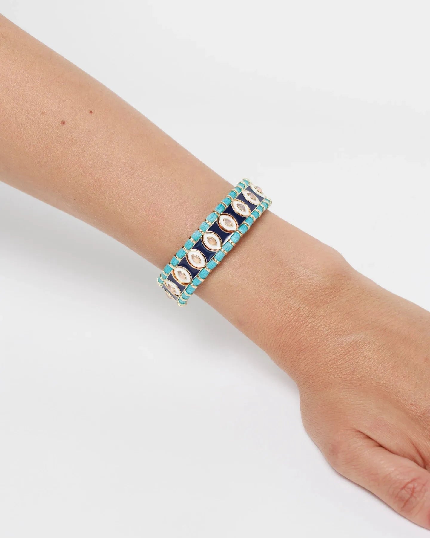 MyAleph Riviera Bracelet on wrist with turquoise and yellow enamel beads, hand-wrapped cotton cord, and adjustable closure