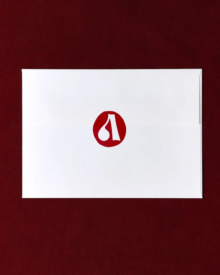 White card with a red logo on a maroon background