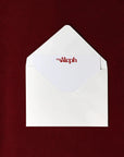 White envelope with 'myAlph' logo on a dark red background