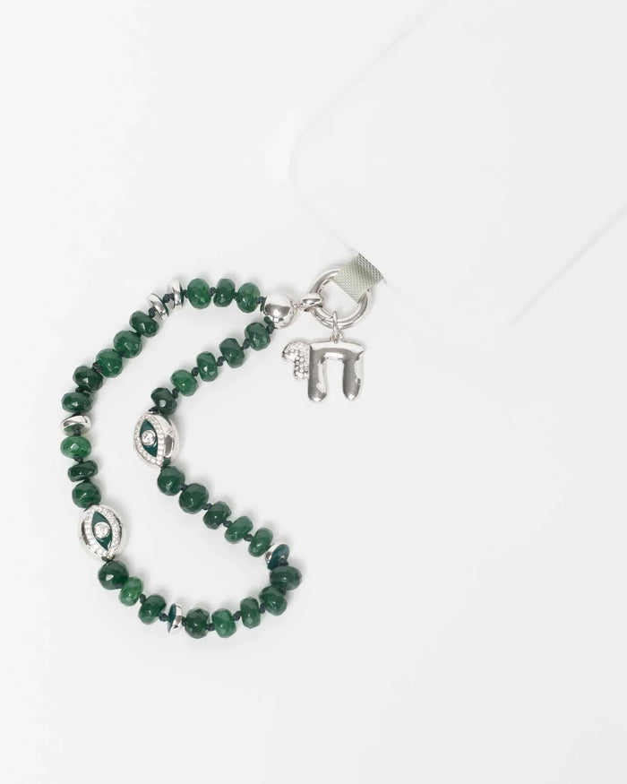 MyAleph Chai Necklace styled with emerald phone charm strap, silver Hebrew life symbol pendant with white stone